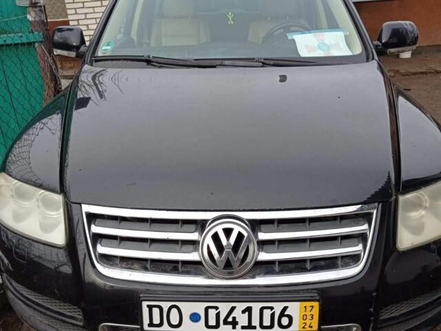 Черный Фольксваген Туарег, объемом двигателя 5 л и пробегом 290 тыс. км за 5000 $, фото 3 на Automoto.ua