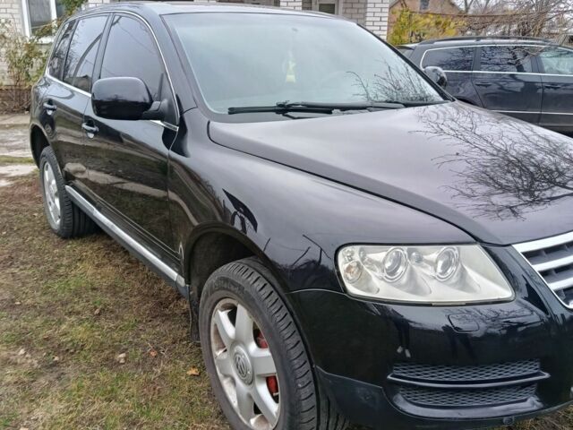 Черный Фольксваген Туарег, объемом двигателя 3.2 л и пробегом 320 тыс. км за 7800 $, фото 1 на Automoto.ua