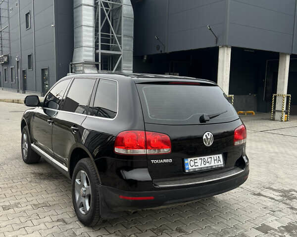 Черный Фольксваген Туарег, объемом двигателя 2.5 л и пробегом 427 тыс. км за 7700 $, фото 7 на Automoto.ua