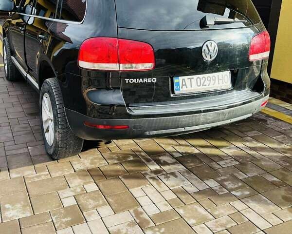 Чорний Фольксваген Туарег, об'ємом двигуна 2.46 л та пробігом 330 тис. км за 7300 $, фото 2 на Automoto.ua