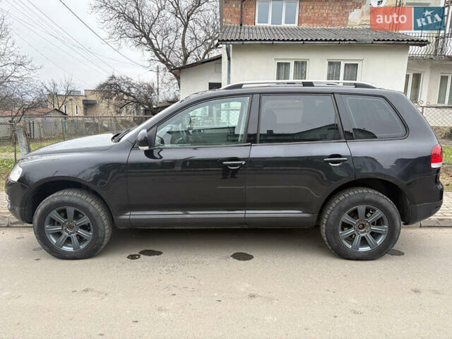 Черный Фольксваген Туарег, объемом двигателя 2.51 л и пробегом 321 тыс. км за 5999 $, фото 2 на Automoto.ua