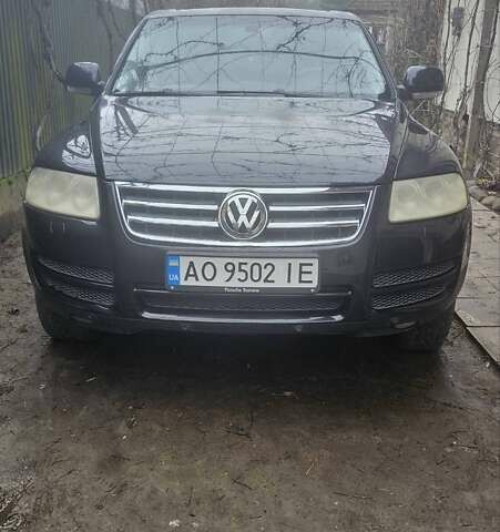 Чорний Фольксваген Туарег, об'ємом двигуна 2.46 л та пробігом 390 тис. км за 8500 $, фото 1 на Automoto.ua