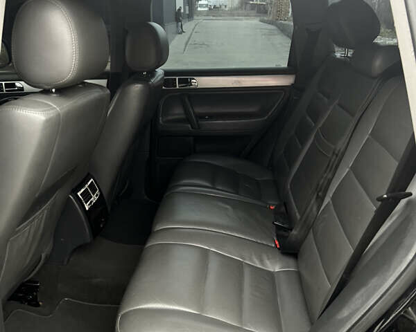 Черный Фольксваген Туарег, объемом двигателя 2.5 л и пробегом 427 тыс. км за 7700 $, фото 23 на Automoto.ua