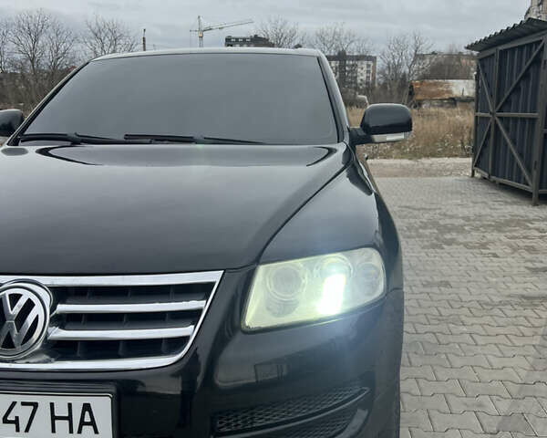 Черный Фольксваген Туарег, объемом двигателя 2.46 л и пробегом 426 тыс. км за 7400 $, фото 10 на Automoto.ua