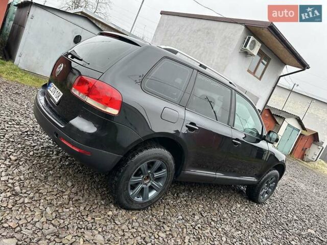 Черный Фольксваген Туарег, объемом двигателя 2.46 л и пробегом 225 тыс. км за 6450 $, фото 11 на Automoto.ua