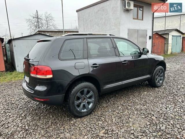 Черный Фольксваген Туарег, объемом двигателя 2.46 л и пробегом 225 тыс. км за 6450 $, фото 10 на Automoto.ua