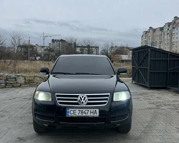 Черный Фольксваген Туарег, объемом двигателя 2.46 л и пробегом 426 тыс. км за 7400 $, фото 1 на Automoto.ua