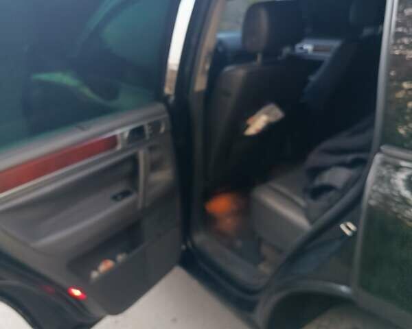 Черный Фольксваген Туарег, объемом двигателя 3.2 л и пробегом 210 тыс. км за 8700 $, фото 3 на Automoto.ua