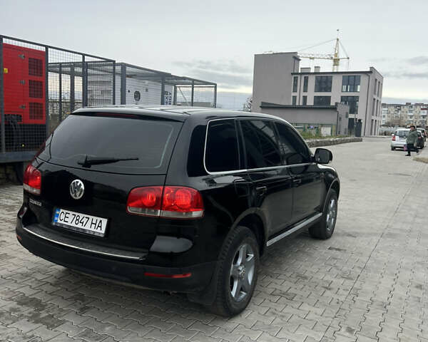 Черный Фольксваген Туарег, объемом двигателя 2.46 л и пробегом 426 тыс. км за 7400 $, фото 5 на Automoto.ua