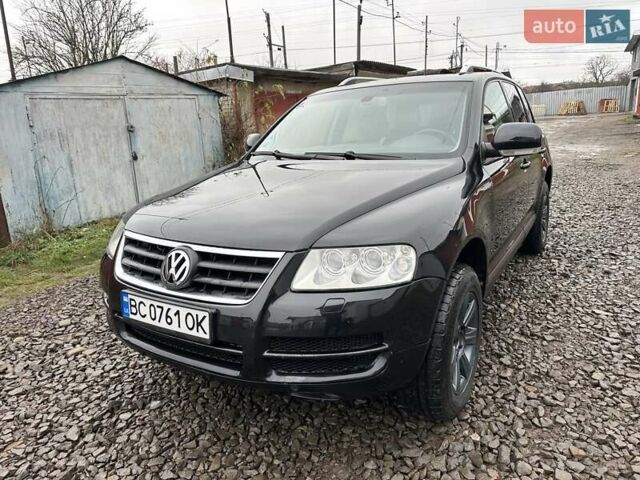 Черный Фольксваген Туарег, объемом двигателя 2.46 л и пробегом 225 тыс. км за 6450 $, фото 2 на Automoto.ua
