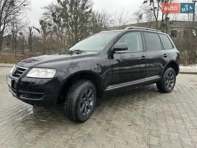 Черный Фольксваген Туарег, объемом двигателя 2.46 л и пробегом 221 тыс. км за 6700 $, фото 2 на Automoto.ua