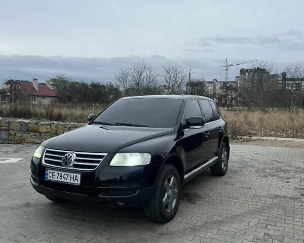 Черный Фольксваген Туарег, объемом двигателя 2.5 л и пробегом 427 тыс. км за 7700 $, фото 1 на Automoto.ua