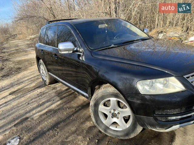 Черный Фольксваген Туарег, объемом двигателя 2.5 л и пробегом 371 тыс. км за 5700 $, фото 1 на Automoto.ua