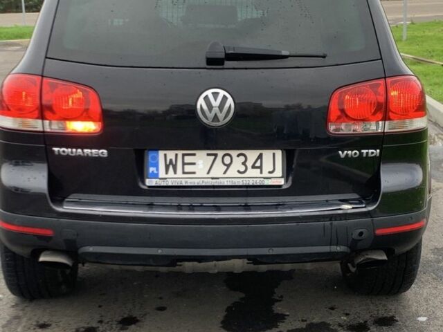 Черный Фольксваген Туарег, объемом двигателя 5 л и пробегом 230 тыс. км за 5800 $, фото 1 на Automoto.ua