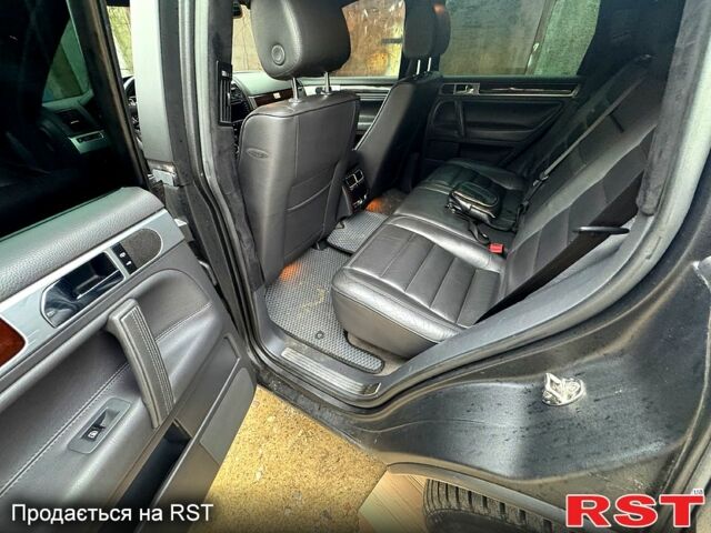 Чорний Фольксваген Туарег, об'ємом двигуна 4.9 л та пробігом 169 тис. км за 6000 $, фото 1 на Automoto.ua