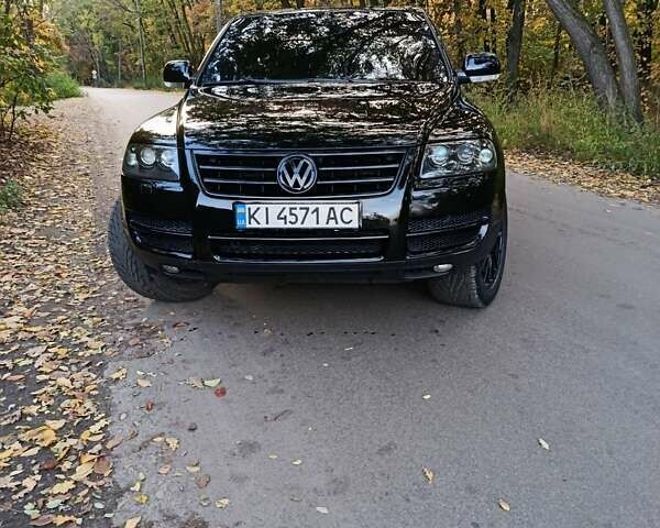 Черный Фольксваген Туарег, объемом двигателя 3.2 л и пробегом 210 тыс. км за 8700 $, фото 2 на Automoto.ua