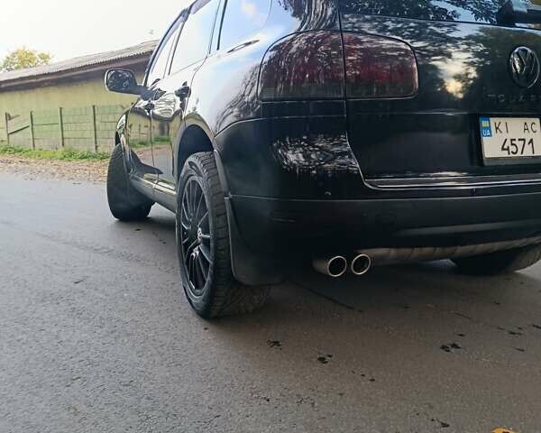 Черный Фольксваген Туарег, объемом двигателя 3.2 л и пробегом 210 тыс. км за 8700 $, фото 7 на Automoto.ua