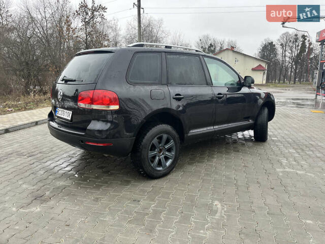 Черный Фольксваген Туарег, объемом двигателя 2.46 л и пробегом 221 тыс. км за 6700 $, фото 11 на Automoto.ua