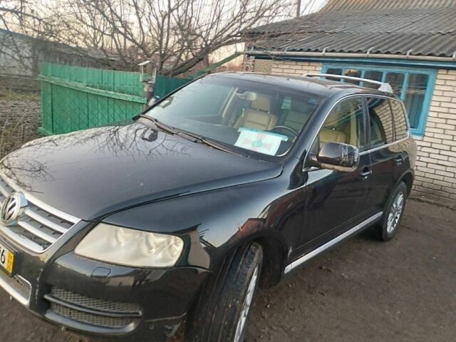 Черный Фольксваген Туарег, объемом двигателя 5 л и пробегом 290 тыс. км за 5000 $, фото 5 на Automoto.ua