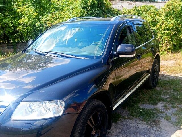 Черный Фольксваген Туарег, объемом двигателя 2.5 л и пробегом 317 тыс. км за 8500 $, фото 1 на Automoto.ua