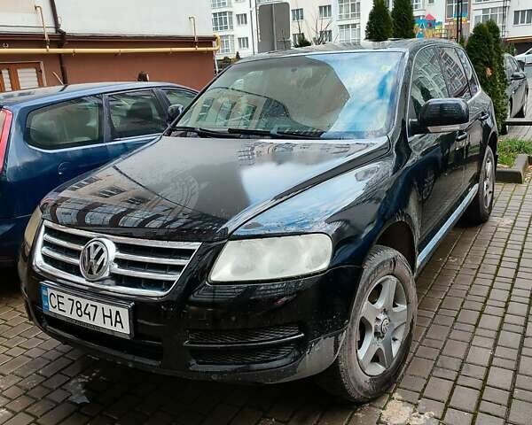Черный Фольксваген Туарег, объемом двигателя 2.5 л и пробегом 426 тыс. км за 7400 $, фото 1 на Automoto.ua