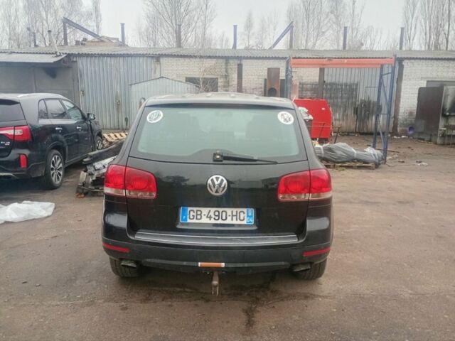 Черный Фольксваген Туарег, объемом двигателя 5 л и пробегом 313 тыс. км за 3500 $, фото 2 на Automoto.ua