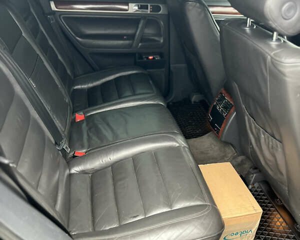 Черный Фольксваген Туарег, объемом двигателя 3 л и пробегом 325 тыс. км за 5900 $, фото 9 на Automoto.ua