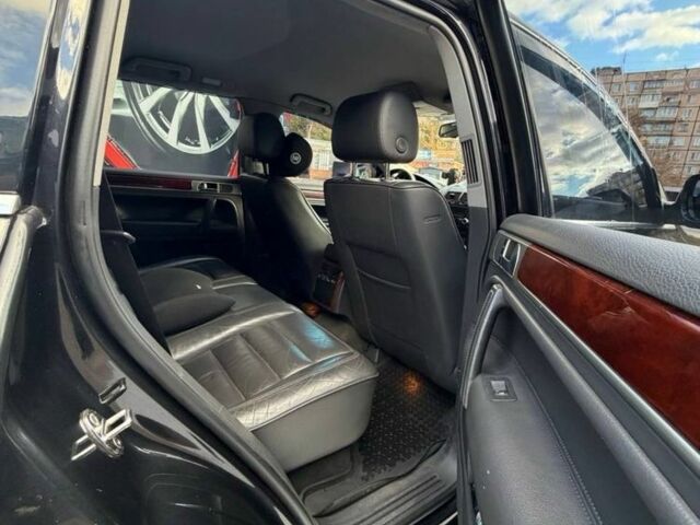 Черный Фольксваген Туарег, объемом двигателя 3.2 л и пробегом 320 тыс. км за 6600 $, фото 6 на Automoto.ua