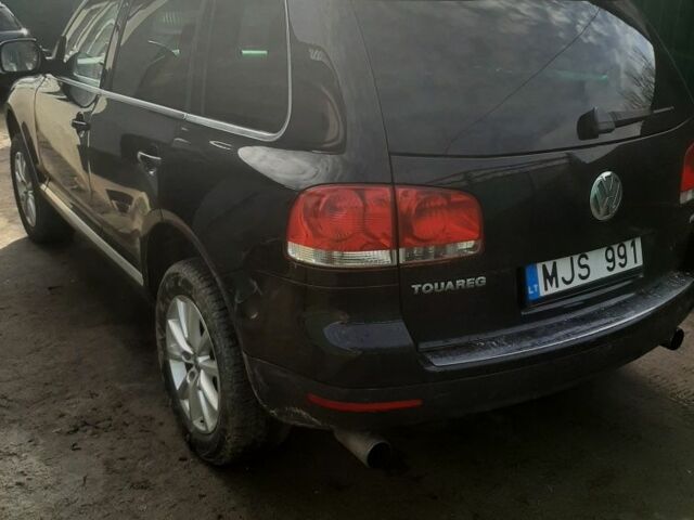 Черный Фольксваген Туарег, объемом двигателя 3 л и пробегом 300 тыс. км за 6500 $, фото 1 на Automoto.ua