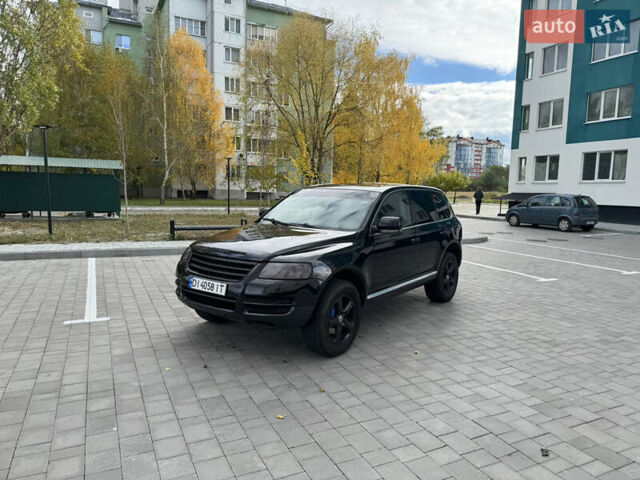 Черный Фольксваген Туарег, объемом двигателя 2.97 л и пробегом 325 тыс. км за 8850 $, фото 6 на Automoto.ua