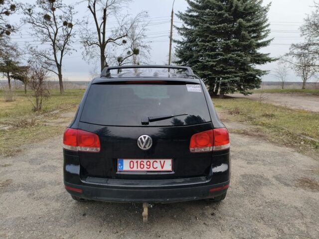 Черный Фольксваген Туарег, объемом двигателя 3 л и пробегом 300 тыс. км за 6500 $, фото 6 на Automoto.ua