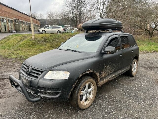 Черный Фольксваген Туарег, объемом двигателя 3 л и пробегом 496 тыс. км за 4250 $, фото 1 на Automoto.ua