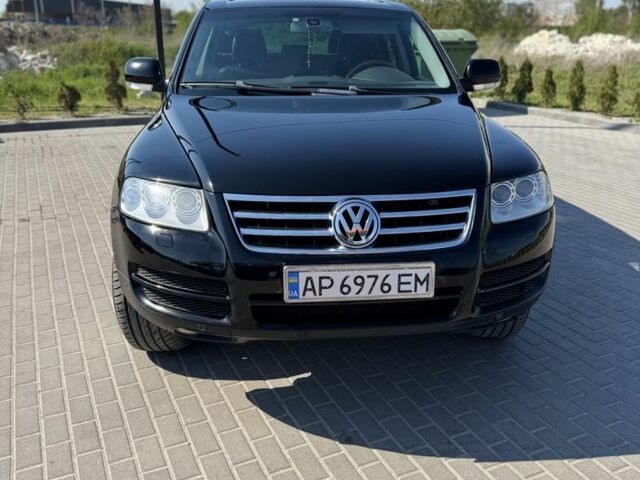 Черный Фольксваген Туарег, объемом двигателя 3 л и пробегом 270 тыс. км за 9990 $, фото 1 на Automoto.ua