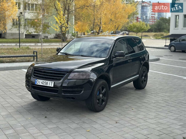 Черный Фольксваген Туарег, объемом двигателя 2.97 л и пробегом 325 тыс. км за 8850 $, фото 1 на Automoto.ua