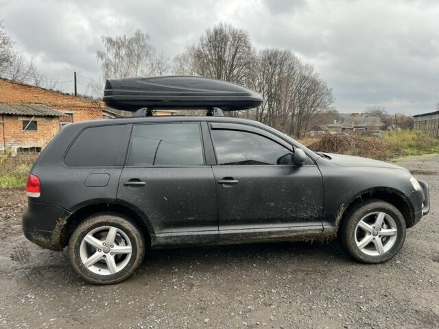 Чорний Фольксваген Туарег, об'ємом двигуна 3 л та пробігом 496 тис. км за 4250 $, фото 6 на Automoto.ua