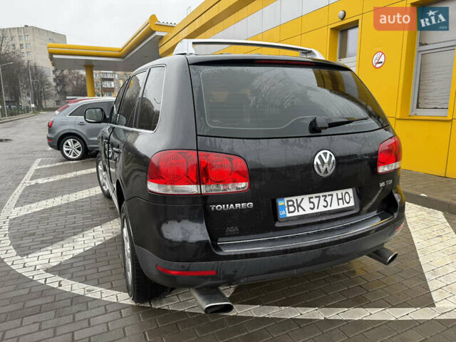 Черный Фольксваген Туарег, объемом двигателя 2.97 л и пробегом 329 тыс. км за 9500 $, фото 8 на Automoto.ua