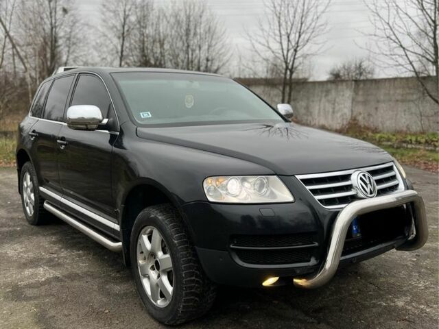 Чорний Фольксваген Туарег, об'ємом двигуна 3 л та пробігом 325 тис. км за 5999 $, фото 3 на Automoto.ua