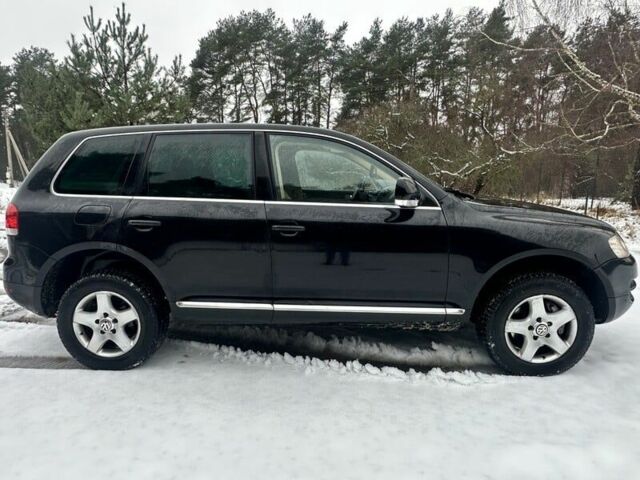 Черный Фольксваген Туарег, объемом двигателя 3 л и пробегом 295 тыс. км за 3636 $, фото 5 на Automoto.ua