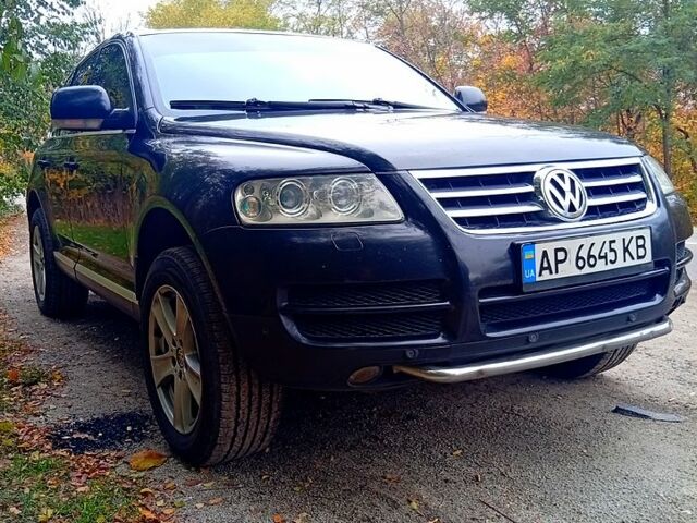 Черный Фольксваген Туарег, объемом двигателя 2.5 л и пробегом 351 тыс. км за 7500 $, фото 2 на Automoto.ua