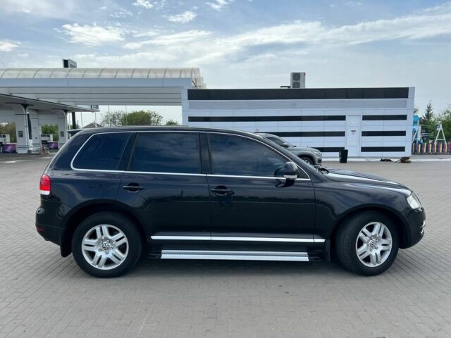 Черный Фольксваген Туарег, объемом двигателя 4.2 л и пробегом 318 тыс. км за 6500 $, фото 4 на Automoto.ua