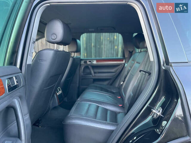 Черный Фольксваген Туарег, объемом двигателя 2.46 л и пробегом 249 тыс. км за 7800 $, фото 7 на Automoto.ua