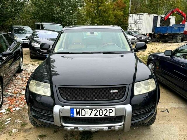 Чорний Фольксваген Туарег, об'ємом двигуна 5 л та пробігом 110 тис. км за 5000 $, фото 10 на Automoto.ua