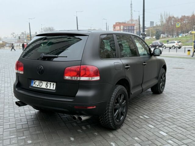 Черный Фольксваген Туарег, объемом двигателя 3 л и пробегом 360 тыс. км за 3999 $, фото 2 на Automoto.ua