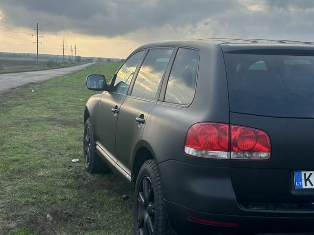 Чорний Фольксваген Туарег, об'ємом двигуна 3 л та пробігом 326 тис. км за 4800 $, фото 6 на Automoto.ua