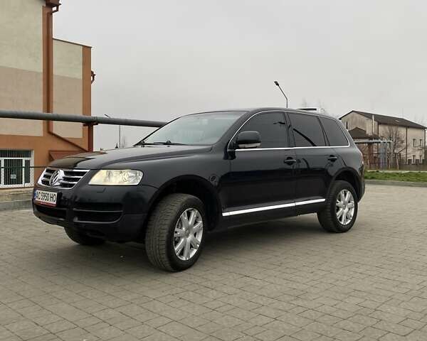 Черный Фольксваген Туарег, объемом двигателя 2.97 л и пробегом 390 тыс. км за 8700 $, фото 4 на Automoto.ua