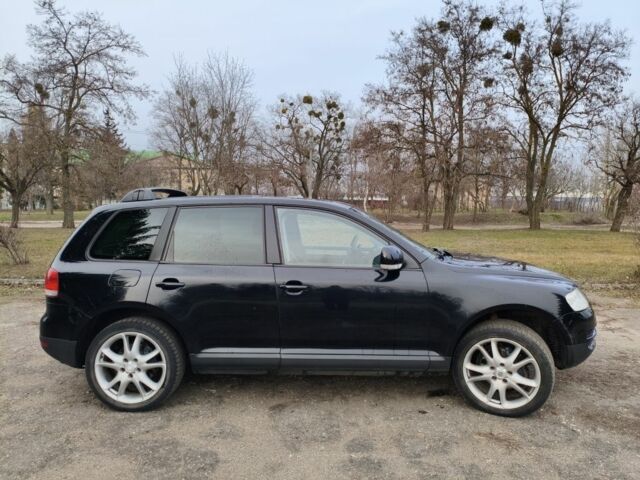 Черный Фольксваген Туарег, объемом двигателя 3 л и пробегом 300 тыс. км за 6500 $, фото 4 на Automoto.ua