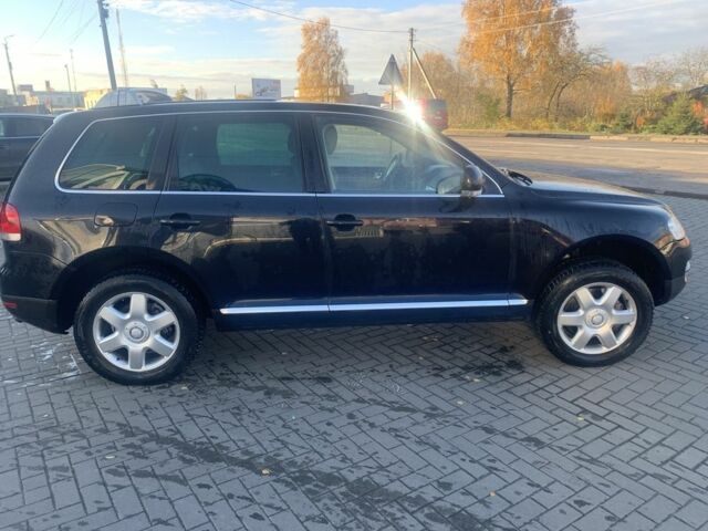 Чорний Фольксваген Туарег, об'ємом двигуна 5 л та пробігом 370 тис. км за 4200 $, фото 3 на Automoto.ua