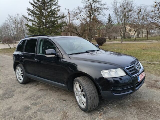 Черный Фольксваген Туарег, объемом двигателя 3 л и пробегом 300 тыс. км за 6500 $, фото 2 на Automoto.ua