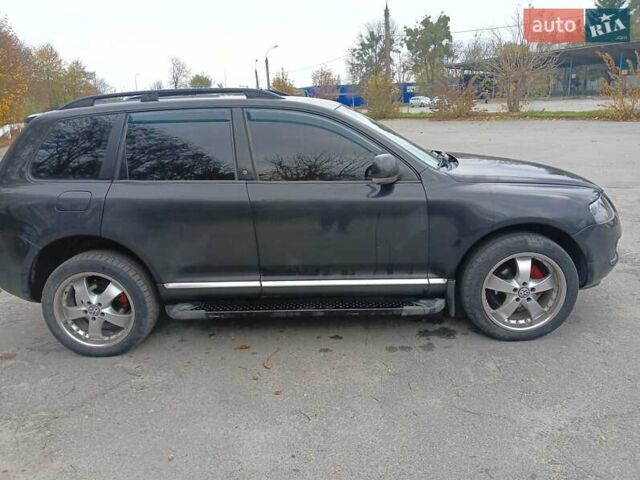 Черный Фольксваген Туарег, объемом двигателя 2.46 л и пробегом 288 тыс. км за 6800 $, фото 4 на Automoto.ua