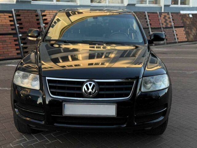 Чорний Фольксваген Туарег, об'ємом двигуна 2.5 л та пробігом 300 тис. км за 4900 $, фото 1 на Automoto.ua